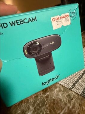 Logitech Webcam with Teal Packaging and Black Camera